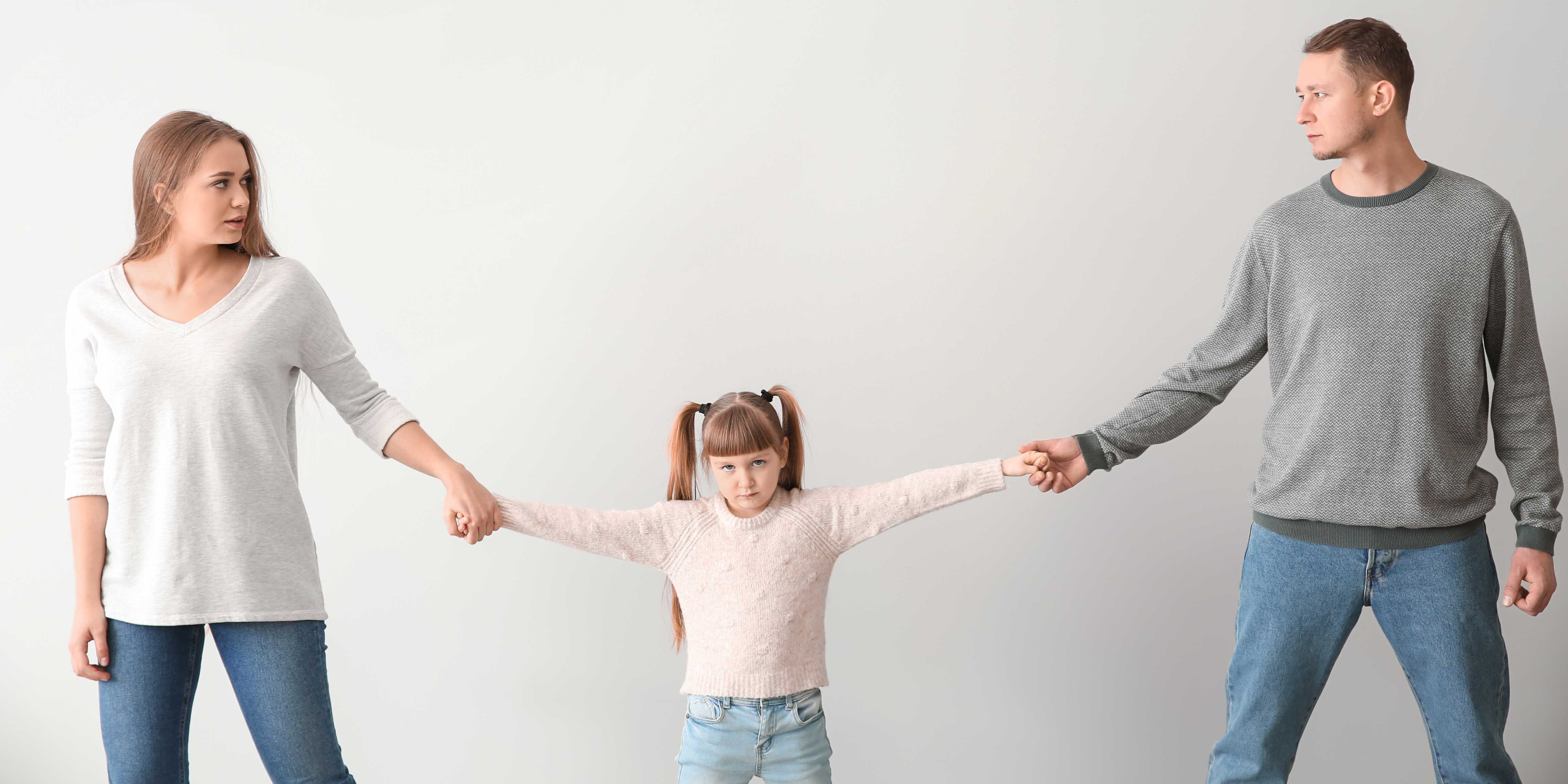 child torn between parents